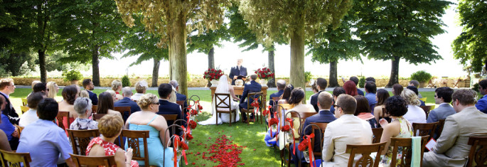 red outdoor wedding ceremony Tuscany