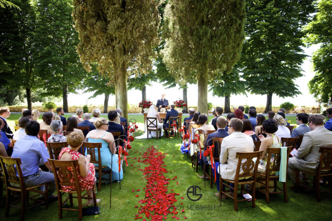 red outdoor wedding ceremony Tuscany